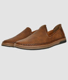 Brown men's slip-on loafer shoes with perforated synthetic leather upper and flat TPR sole for comfort and breathability