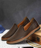Brown men's designer slip-on loafer shoes with perforated synthetic leather and flat TPR sole