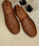 Brown men's slip-on loafer shoes with perforated synthetic leather and flat TPR sole for comfort and style